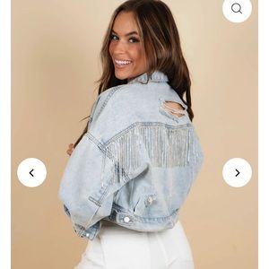 Rhinestone jean jacket. Worn once so great condition. Just no longer need.